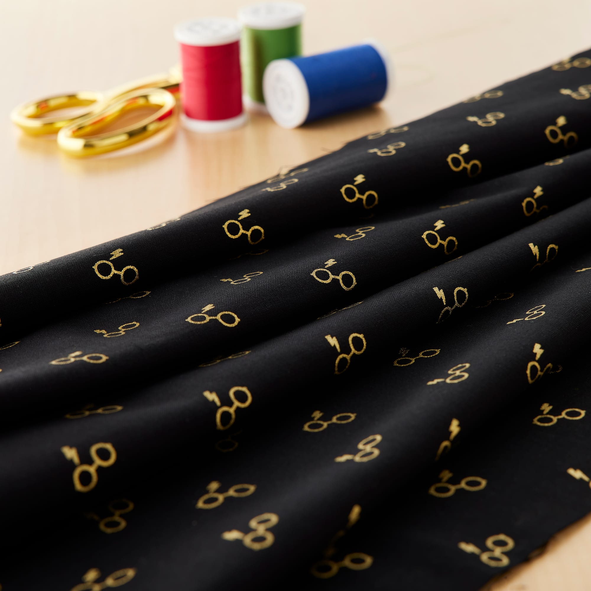 Camelot® Fabrics Harry Potter™ Metallic Lightning Bolt & Glasses on Black Cotton Fabric